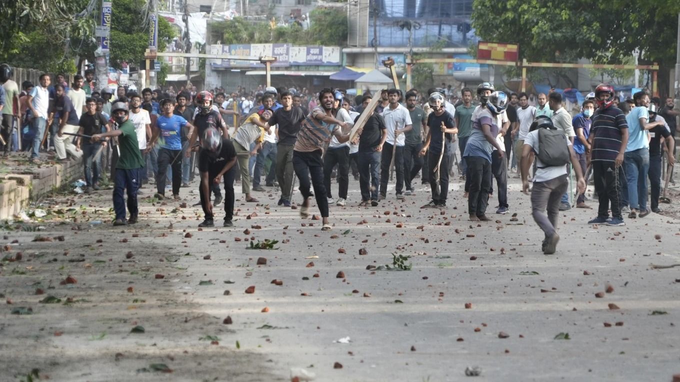 Bangladesh enforces a curfew after days of deadly student protests over government jobs quota