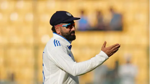 rohit-sharma-1735525184598-16_9.webp?tr=f-jpeg