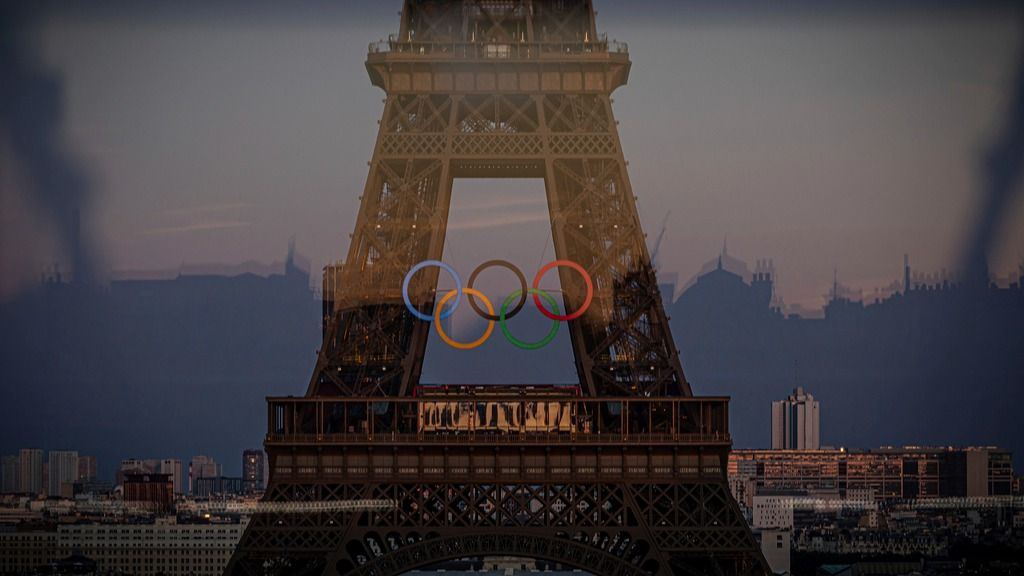 Eiffel Tower Evacuated After Shirtless Man Scales It Hours Before Closing Ceremony in Paris | VIDEO