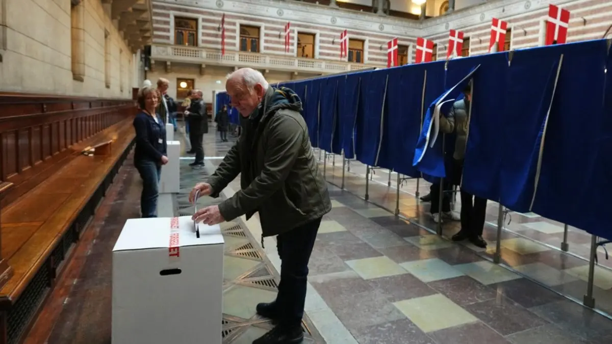 Denmark Votes In An Early Election That Follows A Crisis Over US Designs On Greenland A man casts a ballot at a polling station at City Hall in Copenhagen, Denmark, on Tuesday, March 24, 2026, during the general election.