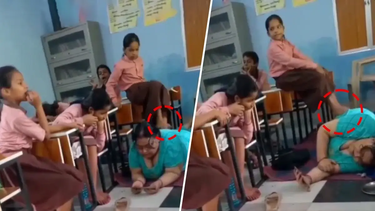 Caught On Cam: UP School Principal Enjoying 'Foot Massage' From Girl Students, Video Sparks Outrage | WATCH Caught On Cam: UP School Principal Enjoying 'Foot Massage' From Girl Students, Video Sparks Outrage | WATCH