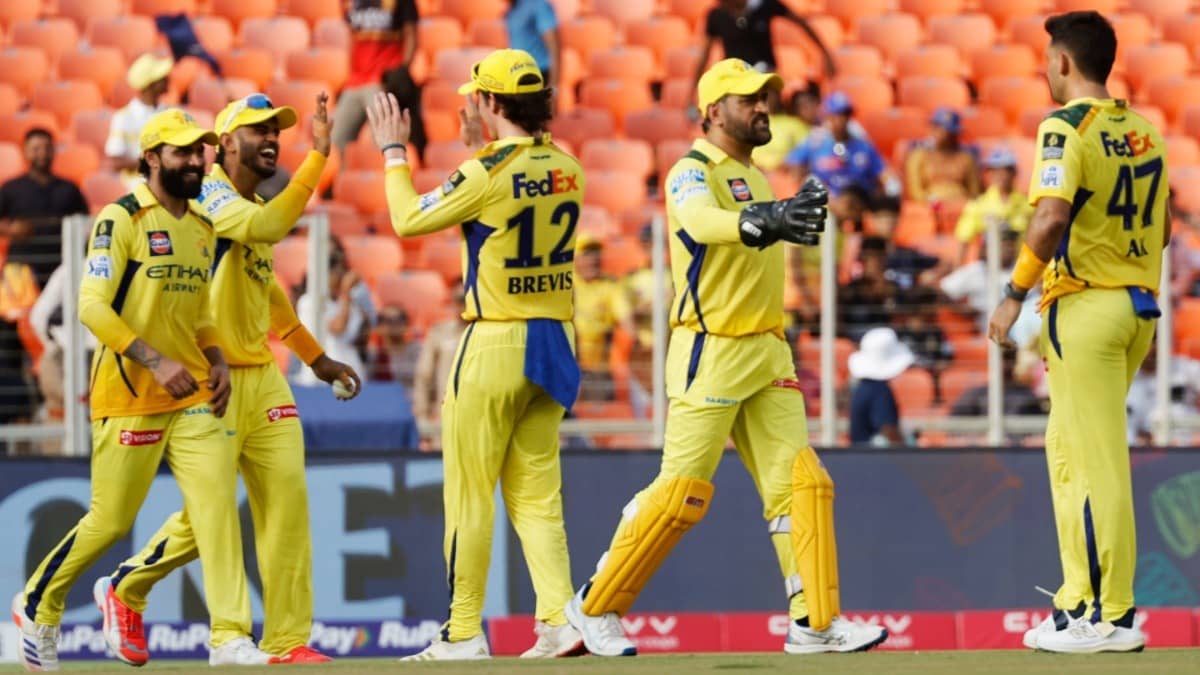 CSK's Urvil Patel, Dewald Brevis, MS Dhoni, and other teammates celebrate after taking a wicket in IPL 2025