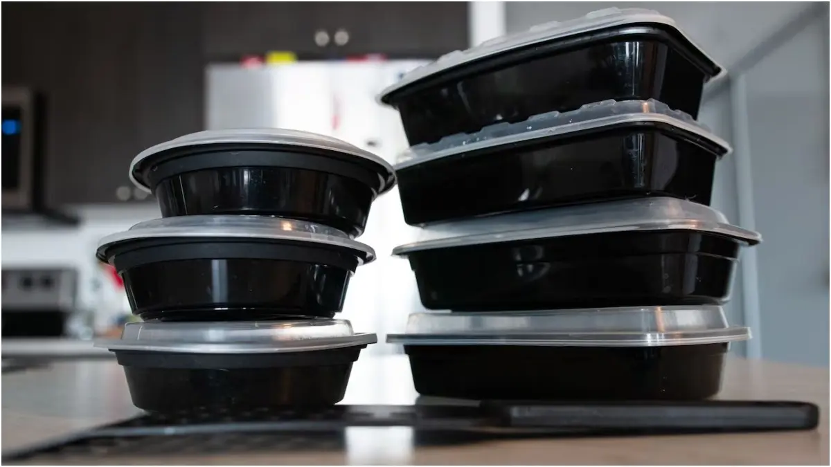 Eating Food Out Of Black Plastic Containers? Here's How It Can Impact Your Health Dangerous chemicals in black plastic containers can seep into the food stored in them