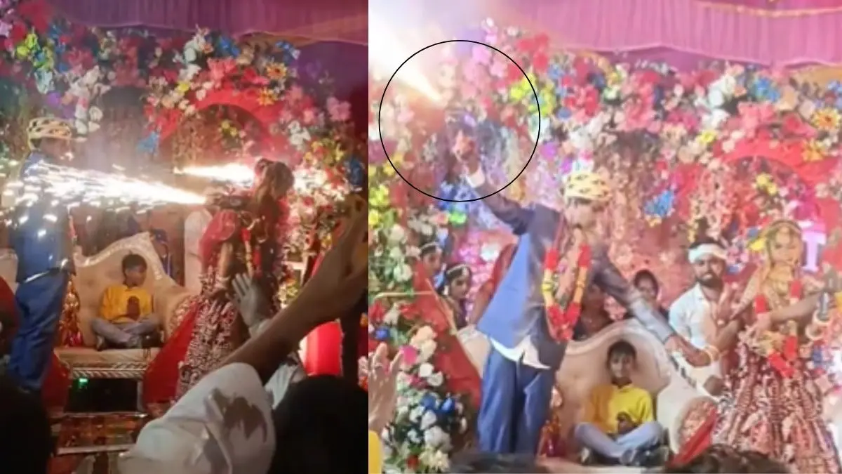 VIRAL VIDEO: हाथों में बंदूक थामे दूल्हा-दुल्हन की 'खतरनाक' एंट्री ने उड़ाए सबके होश, लोग बोले- "वरमाला है या युद्ध की तैयारी" groom bride weird entry holding fire gun in hands unique trend dulha Dulhan viral video