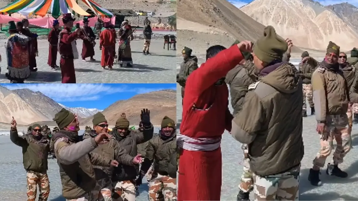Holi at 14,300 Ft: Amid Freezing Cold, ITBP Jawans Celebrate Festival With Villagers Near Pangong Lake | WATCH Holi at 14,300 Ft: Amid Freezing Cold, ITBP Jawans Celebrate Festival With Villagers Near Pangong Lake | WATCH