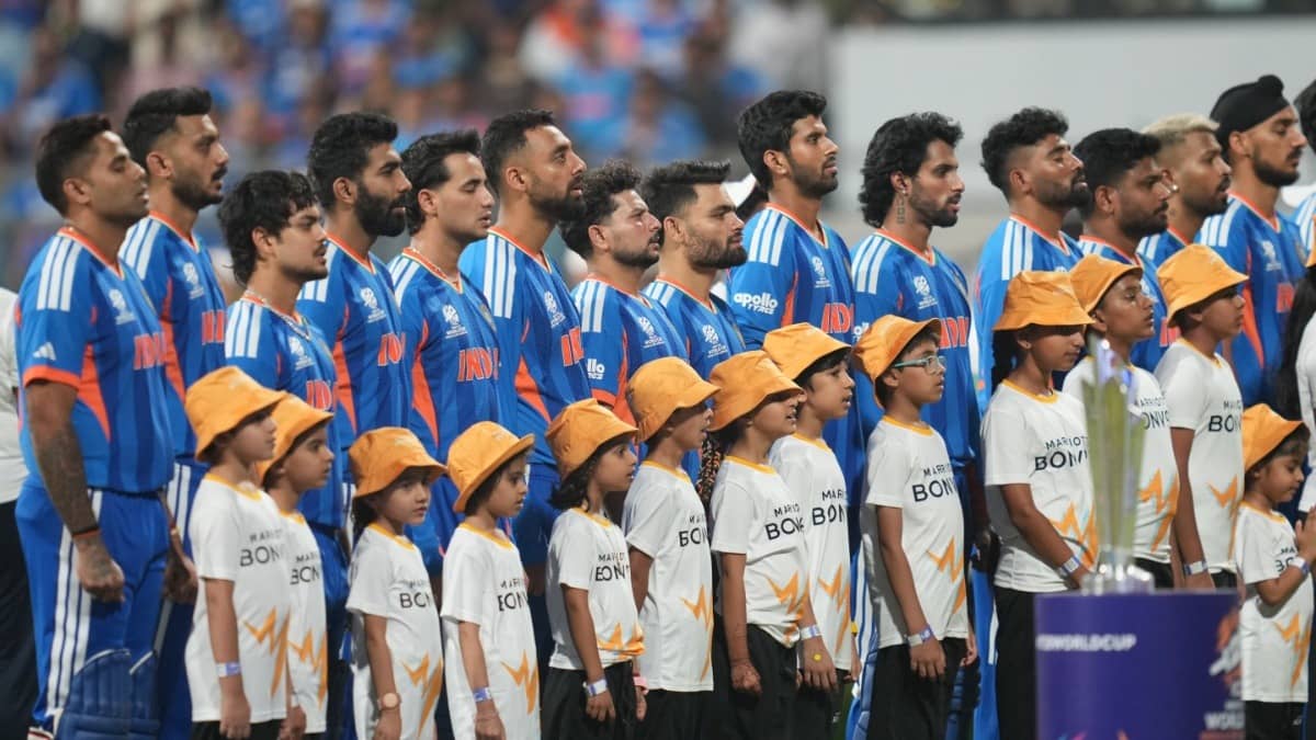 Indian players stand up for their national anthem ahead of England clash