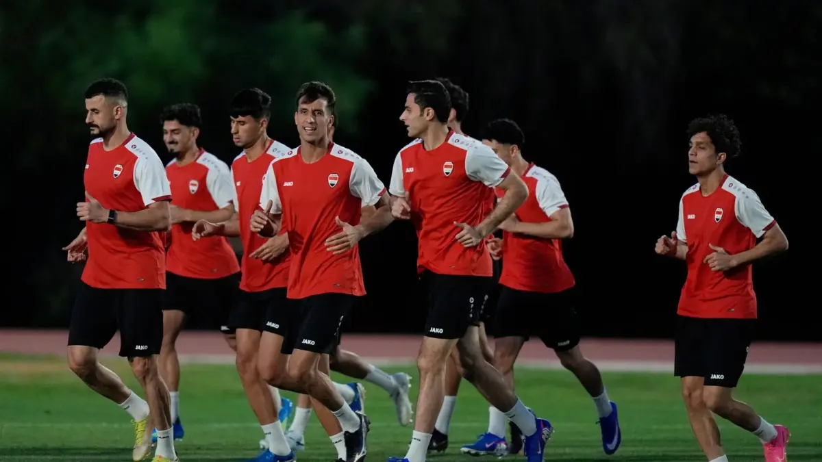 After A Harrowing Travel Ordeal, Iraq Face Bolivia For A 2026 FIFA World Cup Spot Iraq players jog during a training session