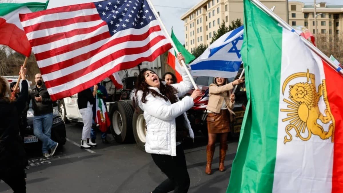 Karla Mohtashemi celebrates as Voice of Iran hosts a car rally in Washington in response to the U.S. bombing of Iran