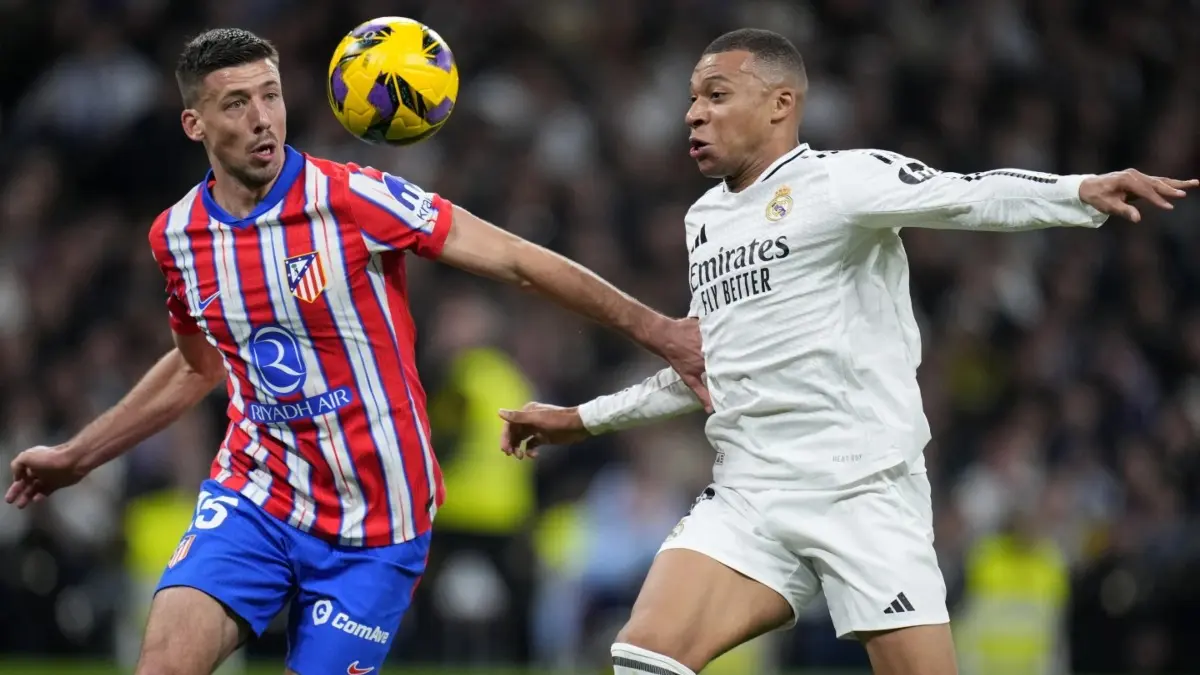 Real Madrid vs Atletico Madrid Live Streaming: When And Where To Watch La Liga In India? Kylian Mbappe fights for a ball with Clement Lenglet