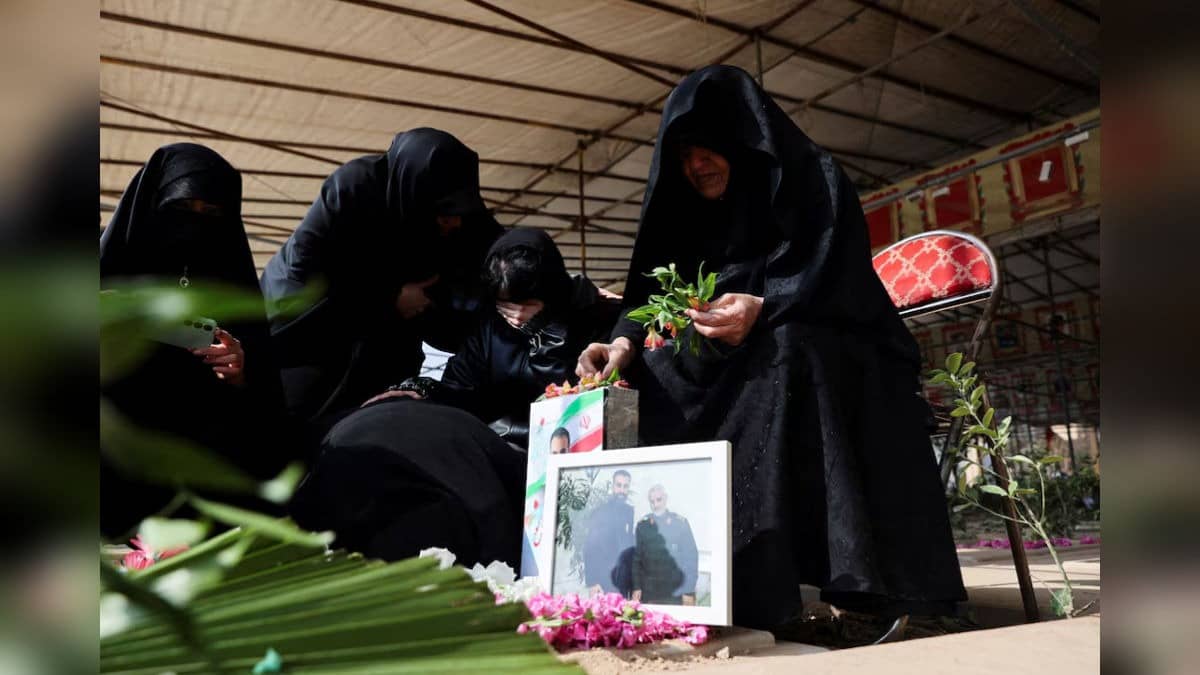 People attend a funeral ceremony for victims of Israeli and US strikes, amid the US-Israeli conflict with Iran, in Tehran, Iran.