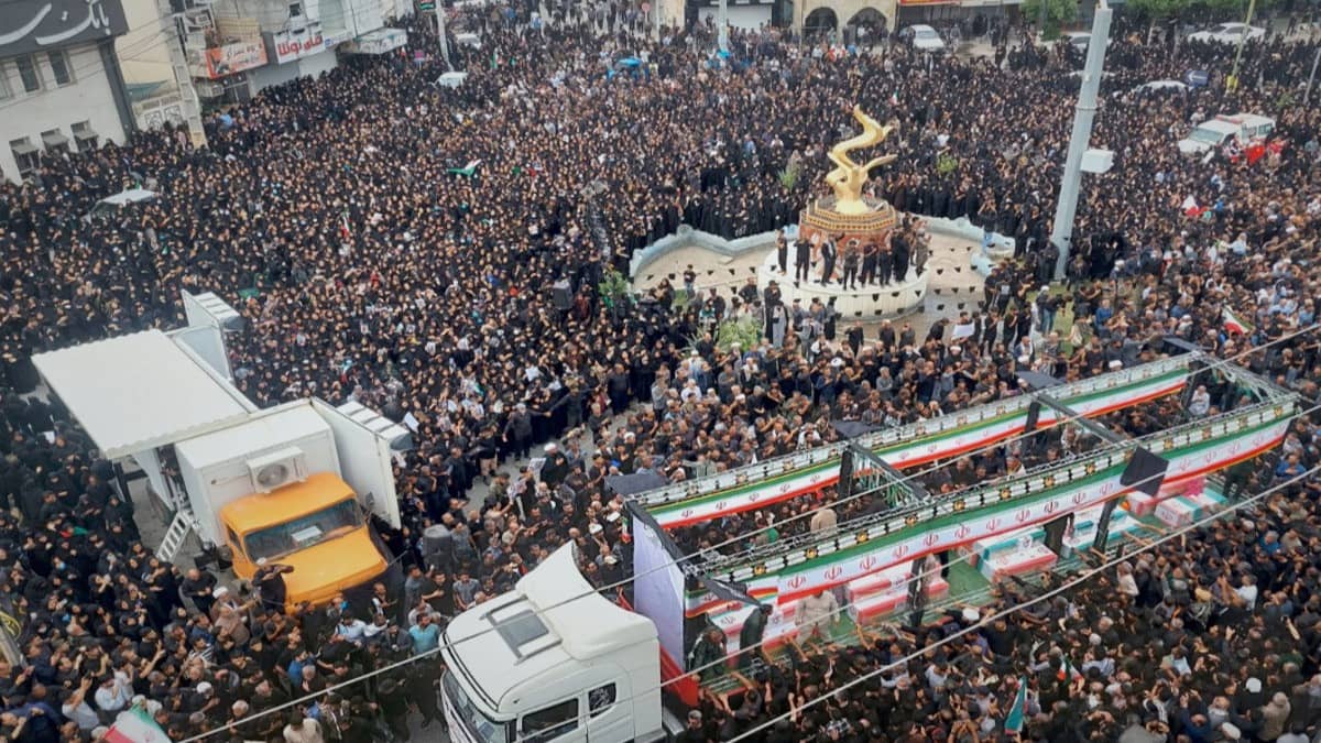 Residents and officials attend the funeral of people killed in what Iranian officials said was an Israeli-U.S. strike Feb. 28 on a girls’ elementary school in Minab, Iran