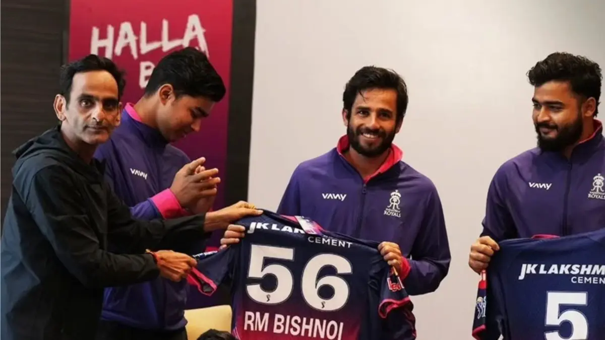 Riyan Parag's Rajasthan Royals Unveil New Match Jersey Ahead Of IPL 2026 Riyan Parag, Ravi Bishnoi, and Vaibhav Sooryavanshi with Rajasthan Royals' new jersey