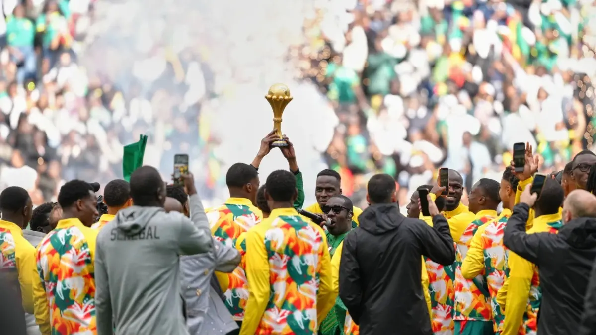 Senegal Parade AFCON Trophy In Paris As It Appeals CAF Decision To Strip Title Senegal players celebrates with AFCON trophy