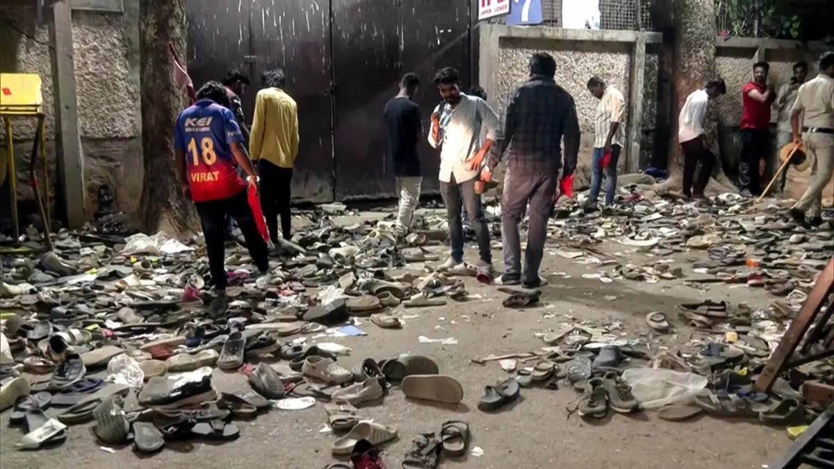 RCB Players To Wear Black Armbands During IPL 2026 Opener As Tribute To Fans Killed In Chinnaswamy Stampede Several shoes and slippers lying outside Chinnaswamy Stadium after a stampede during RCB's IPL 2025 victory celebrations