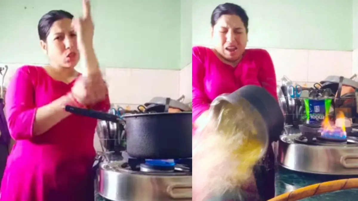VIRAL: 'चांदनी रात में गोली चल गई' गाने पर महिला रसोई में बना रही थी REEL, हाथ पर गिरी खौलती दाल; VIDEO देख शॉक रह गई पब्लिक! Viral Video