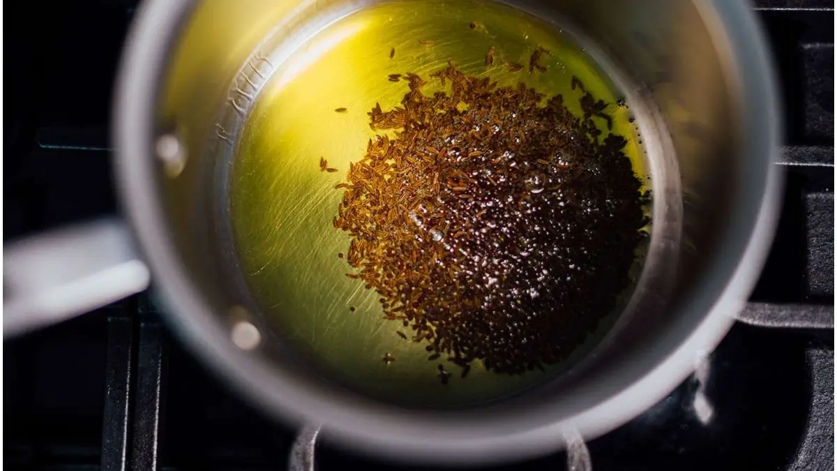 How To Temper A Dish Correctly To Avoid Oil Spillage And Stains? Adding tadka enhances the flavour of a dish