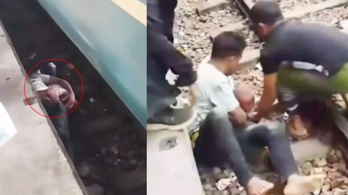 चलती ट्रेन के नीचे फंस गए थे बाप-बेटे, ऊपर से गुजर गए 8 डिब्बे; पिता ने मसीहा बनकर ऐसे बचाई मासूम की जान, देखिए दिल दहला देने वाला VIDEO Bangladesh father saves-son-trapped-under-moving-train-Bhairab Railway Station viral-video