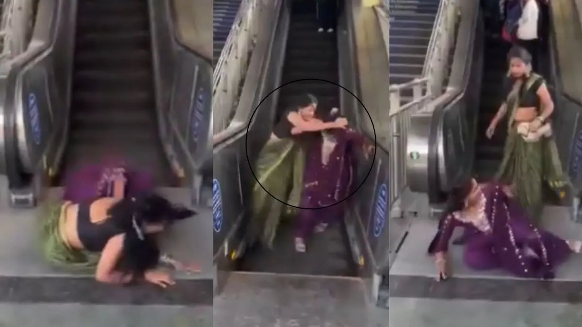 VIRAL VIDEO: पहले एस्केलेटर से घसीटा फिर कूदकर मारी लात और खूब हुआ पंगा, रील बनाना पड़ा भारी? दिल्ली मेट्रो में चोटी पकड़कर भिड़ीं दो महिलाएं delhi-metro-escalator-fight between two girls-video-claimed-scripted-reel-viral-on social media