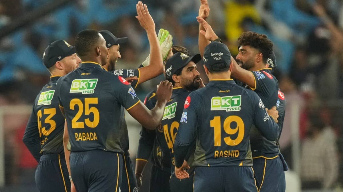 GT players celebrating after taking a wicket against RR