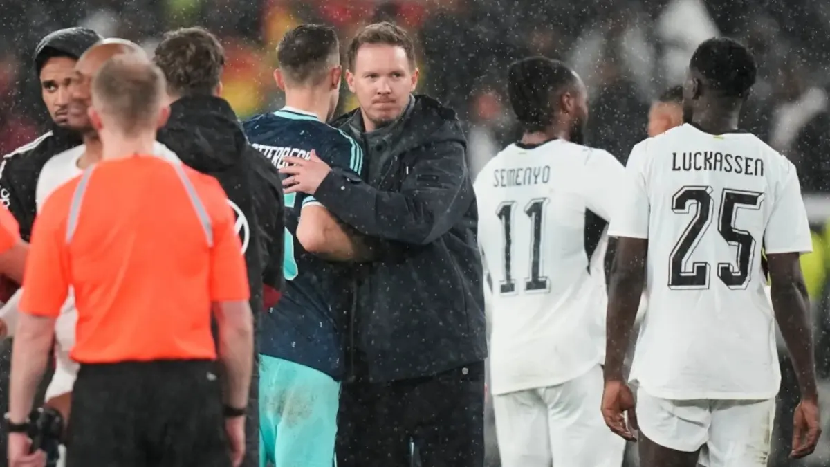 Germany Postpone FIFA World Cup 2026 Squad Announcement Due to Injuries Head coach Julian Nagelsmann of Germany embraces players after winning friendly match against Ghana