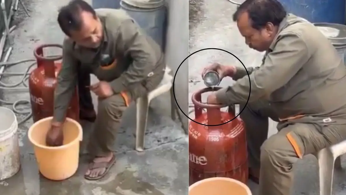 VIRAL VIDEO: लखनऊ में गैस सिलेंडर में पानी भरता पकड़ा गया वेंडर, तो जनता का चढ़ा पारा, नेटिजंस बोले- जान से कर रहा खिलवाड़ lucknow news lpg-gas-cylinder-fraud-delivery-boy-caught-filling-water-in-cylinders safety-concerns-viral-video