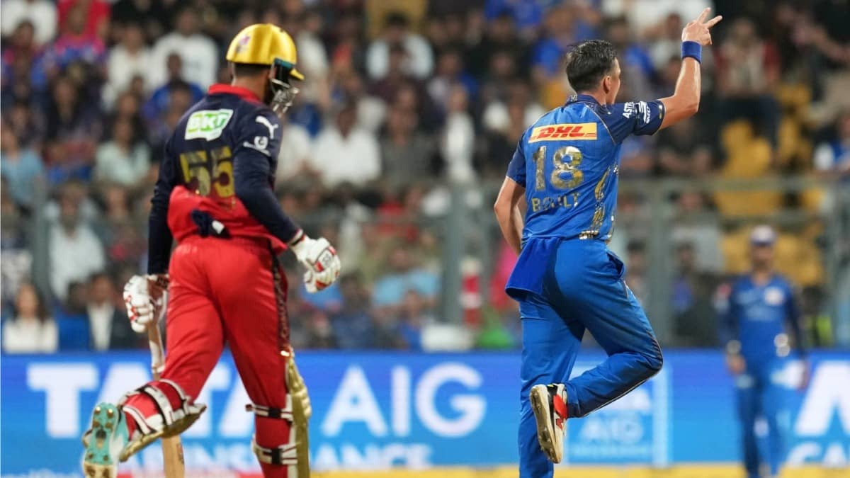 MI pacer Trent Boult celebrates after dismissing RCB's Jitesh Sharma