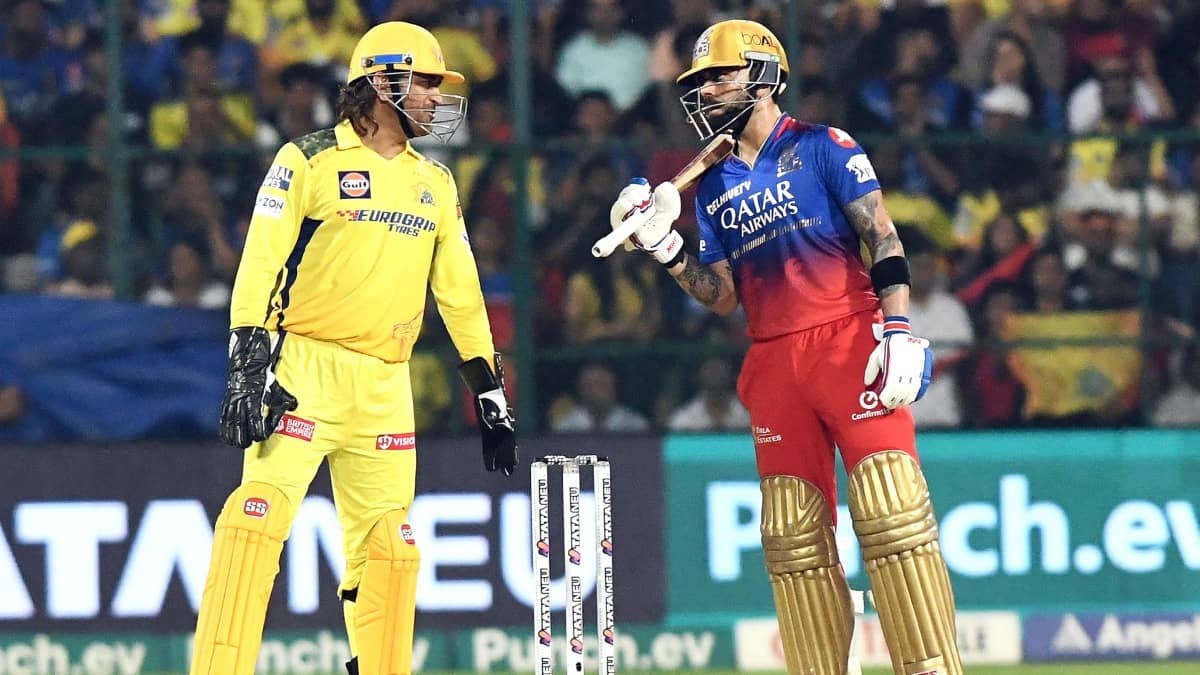 MS Dhoni and Virat Kohli in conversation during a IPL 2025 match