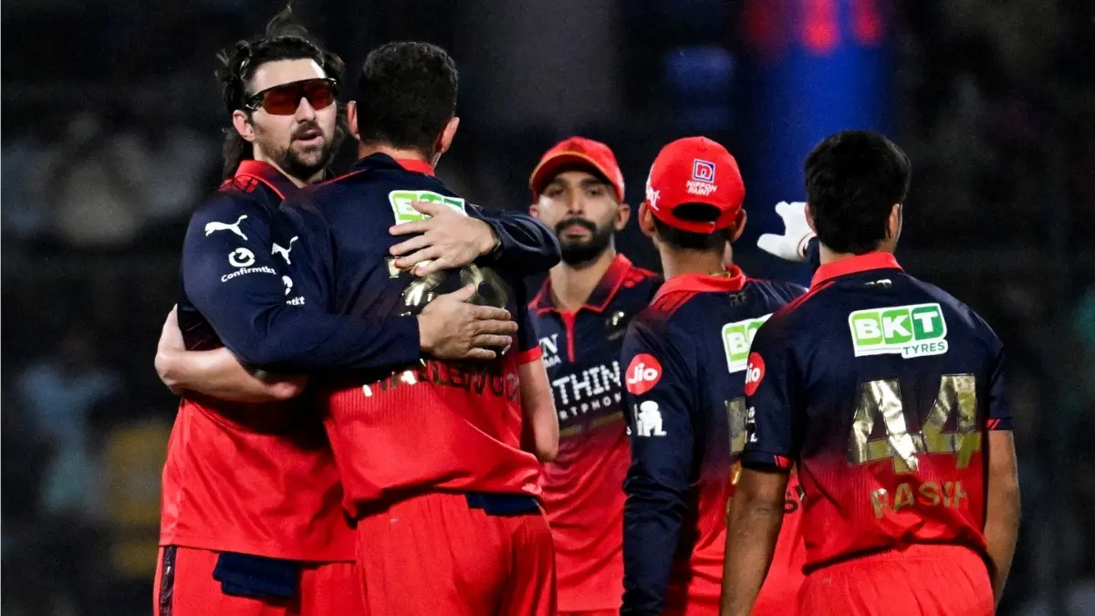 RCB Coach Andy Flower Sets The Tone Ahead Of GT Showdown In IPL 2026: 'We Have An Attack That Can Exploit' RCB players celebrating after taking a wicket