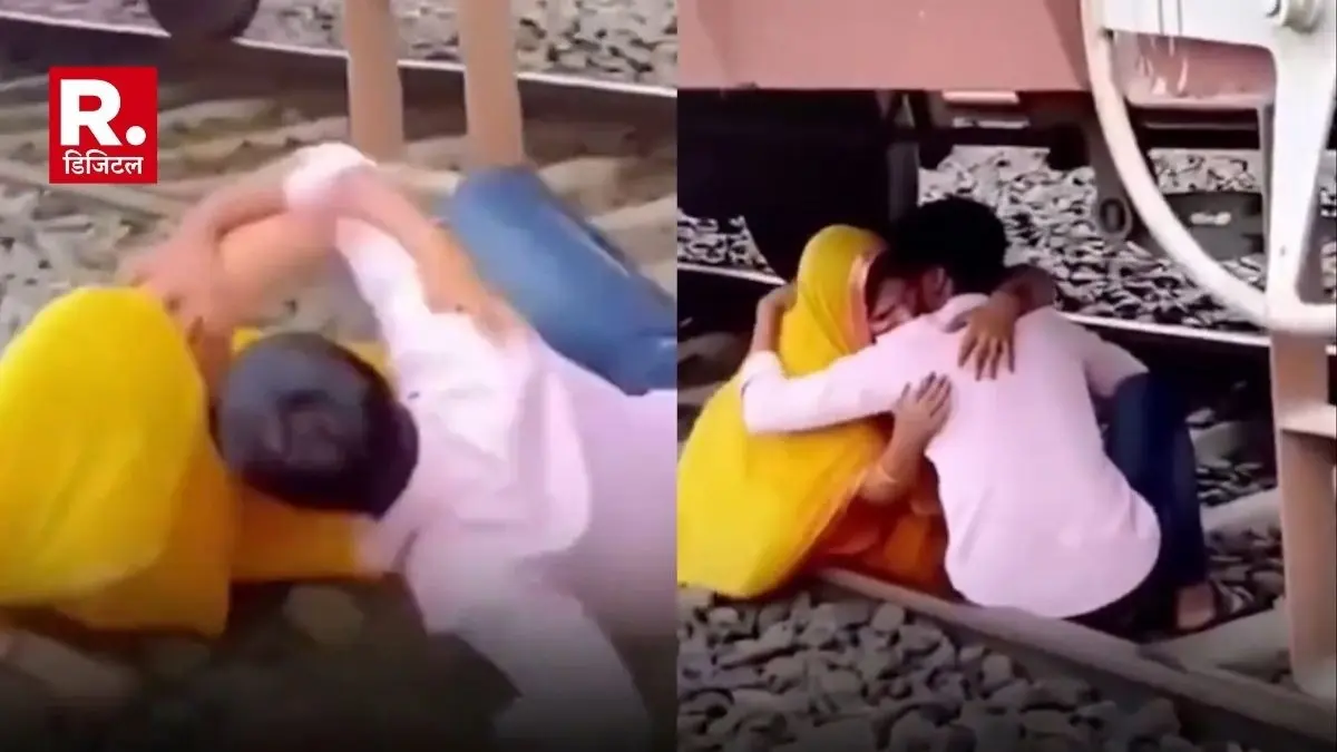 इतने मशगूल? ट्रेन के नीचे रेलवे ट्रैक पर रोमांस कर रहा था प्रेमी जोड़ा, इतने में ही चल दी रेल, वायरल वीडियो ने चौंकाया couple romancing on railway track under a train when the train started moving
