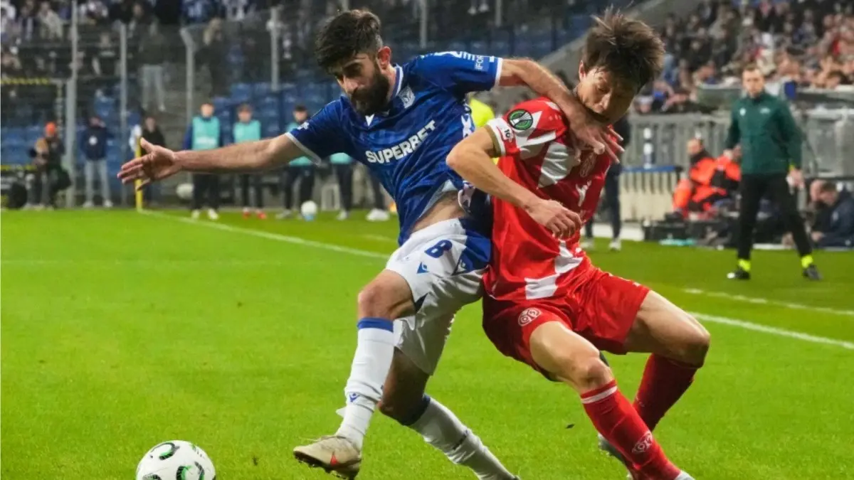 Iran Winger Gholizadeh Out Of World Cup After Injury In Polish League Lech Poznan’s Ali Gholizadeh, left, challenges for the ball with Mainz’s Lee Jae-sung