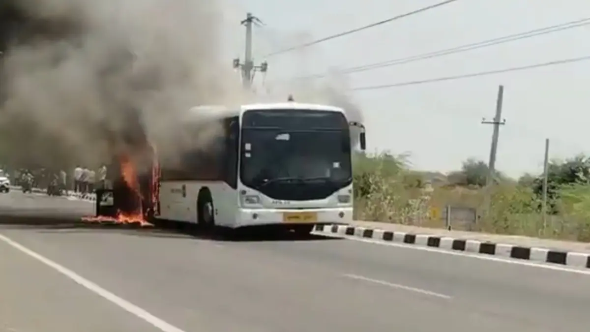 Air India Passenger Bus Catches Fire on Hyderabad ORR; Driver and Cleaner Escape Unhurt Passenger bus belongs to Air India catches fire on the ORR service line
