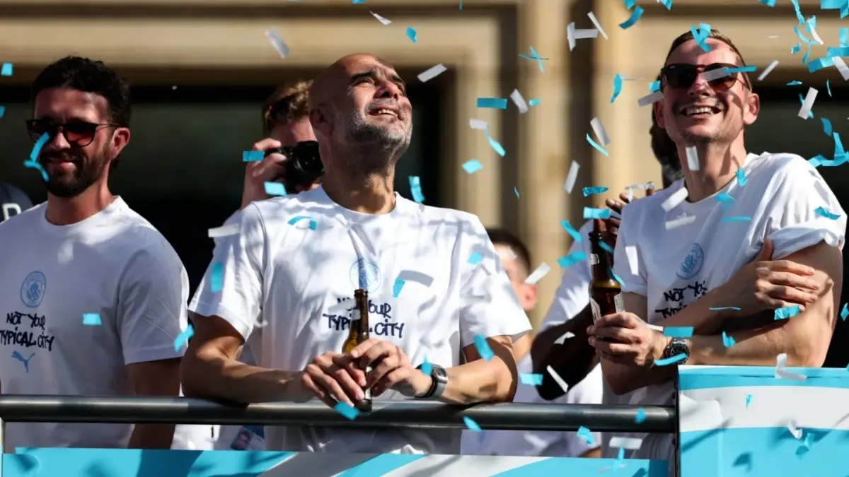 Michael Jordan Pays Tribute To Pep Guardiola During Manchester City Manager's Final Sendoff Pep Guardiola during bus parade celebration