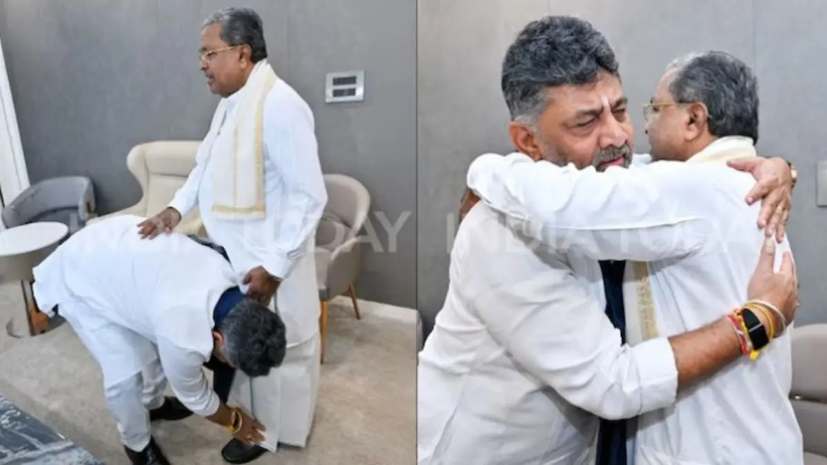 At Breakfast Meet, DK Shivakumar Hugs Siddaramaiah, Touches Feet Ahead of Resignation | VIDEO Power Transition? DK Shivakumar Touches Siddaramaiah’s Feet Ahead of Scheduled CM Resignation, Sparks Buzz