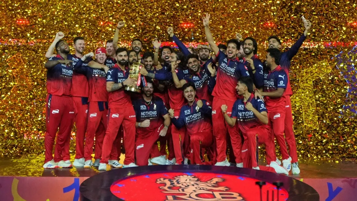 RCB Crowned IPL 2026 Champions As Virat Kohli’s Heroics Down Gujarat Titans In Final RCB players celebrate with the IPL 2026 winners' trophy