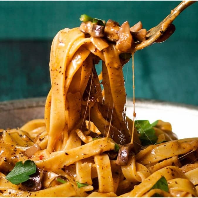 Tips to make better pasta at home include using minimal ingredients