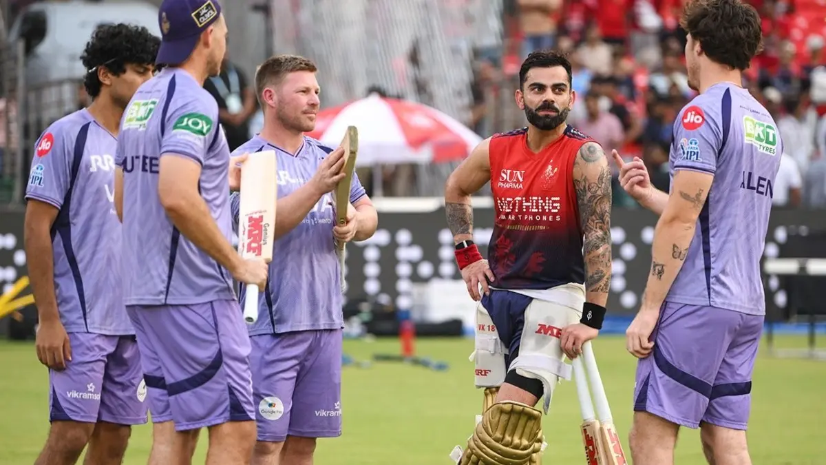 KKR's Virat Kohli Plan Decoded Ahead Of Crucial IPL Playoff Defining Clash vs RCB In Raipur Virat Kohli shares a light moment with KKR players