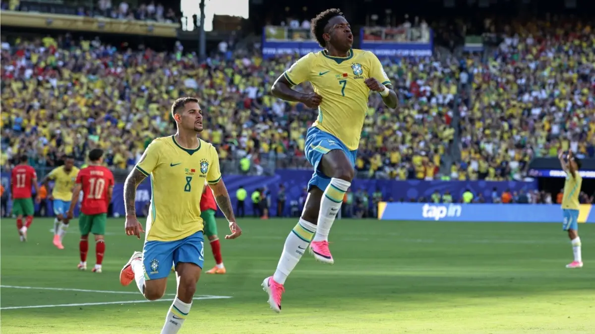FIFA World Cup 2026: Brazil Seek First Win Against Haiti As Carlo Ancelotti Backs Selecao To Improve Brazil's Vinicius Junior celebrates with teammate Bruno Guimaraes after scoring against Morocco