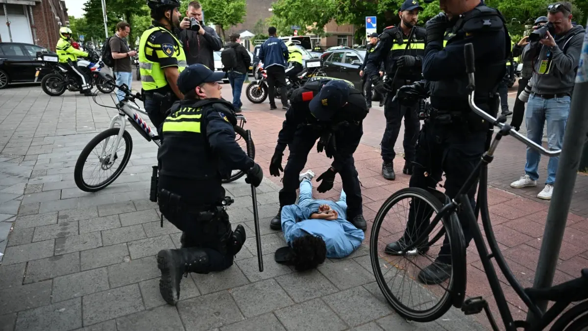 Celebrations Turn Violent In The Hague, Moroccan Supporters Clash With Police After Morocco Stun Netherlands At FIFA World Cup Dutch police arrest a Moroccan fan