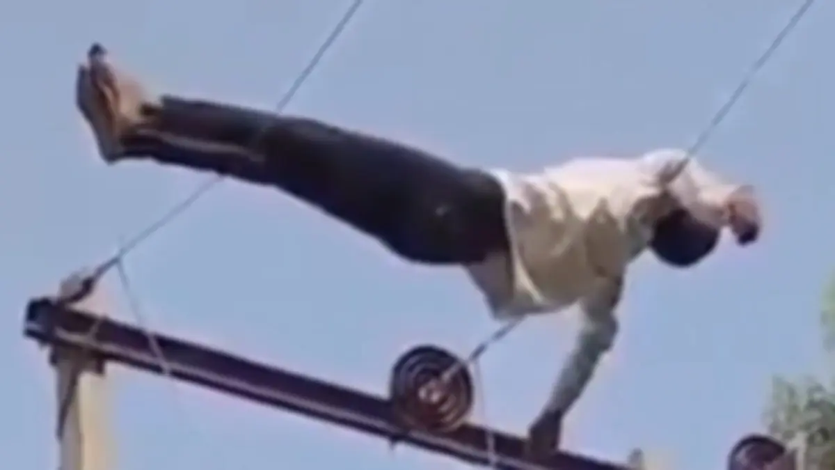 Watch - High on Spirits, Higher on Voltage: Drunk Man Naps on 11,000-Volt Line, Watch Video High on Spirits, Higher on Voltage: Drunk Man Naps on 11,000-Volt Line, Watch Video