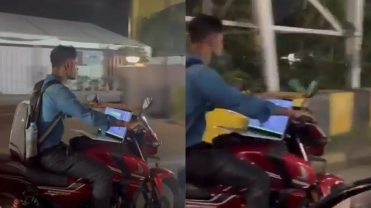 Viral Video: वर्क फ्रॉम बाइक! हैदराबाद में टंकी पर लैपटॉप खोलकर बाइक चला रहा था शख्स, वीडियो देख लोग बोले- अब इंक्रीमेंट पक्का Hyderabad Viral Video Laptop on Bike