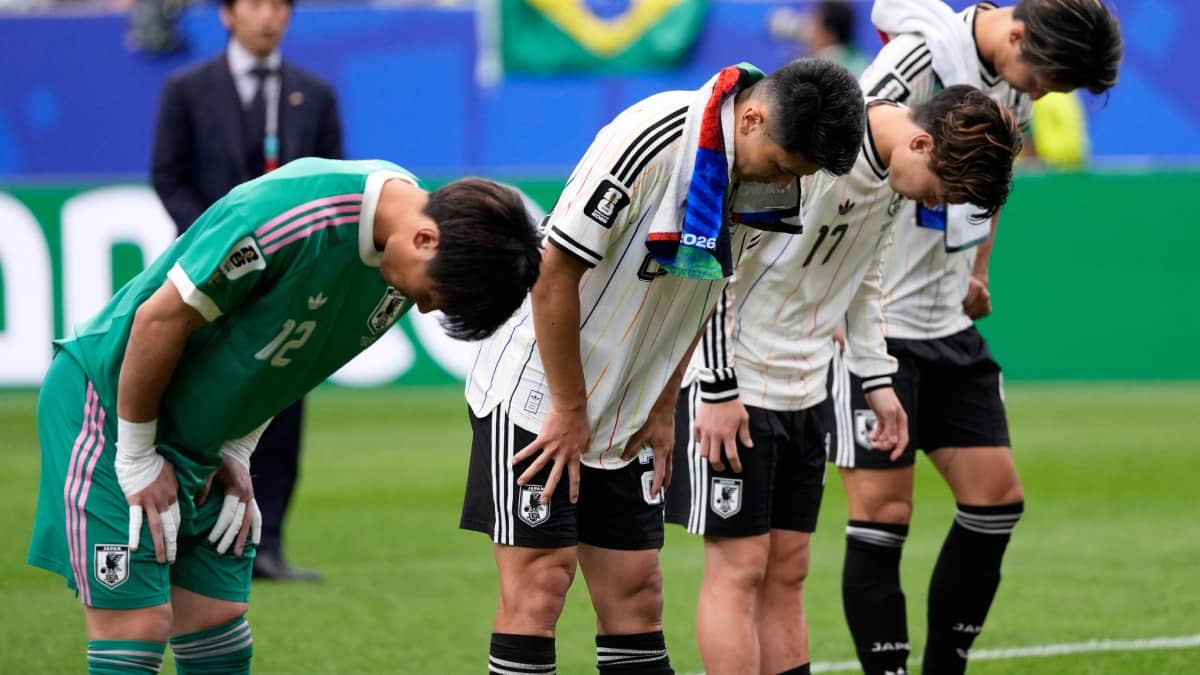 Japanese players bowed down after FIFA World Cup exit