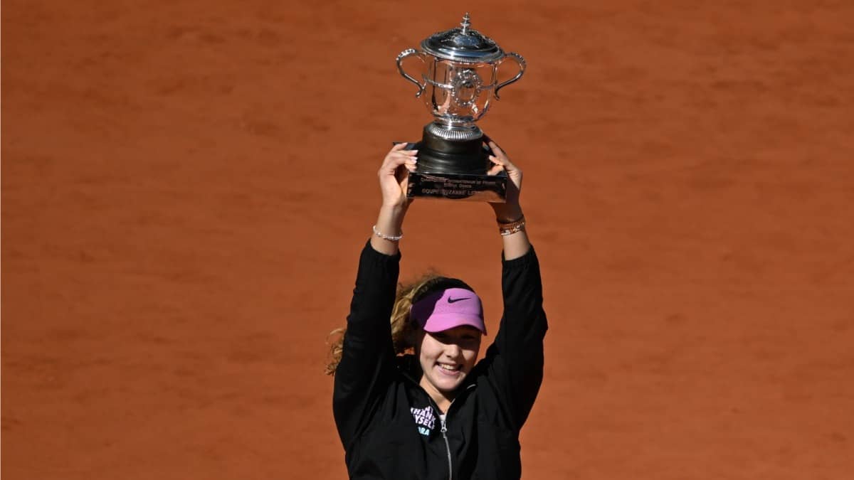 Russia's Mirra Andreeva hold the trophy after winning the French Open 2026