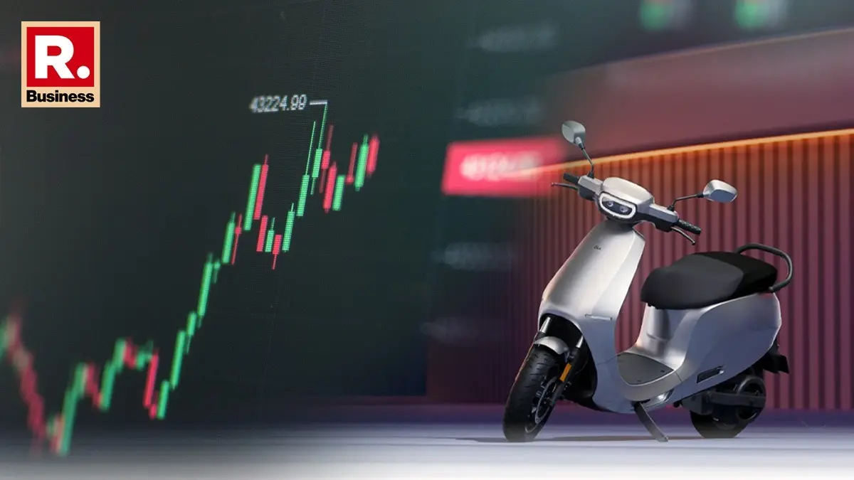 Ola Electric Share Price Falls Over QIP Pricing Discount and Persistent Cash Burn Worries Rows of Ola Electric scooters parked inside the company's manufacturing facility in Tamil Nadu.