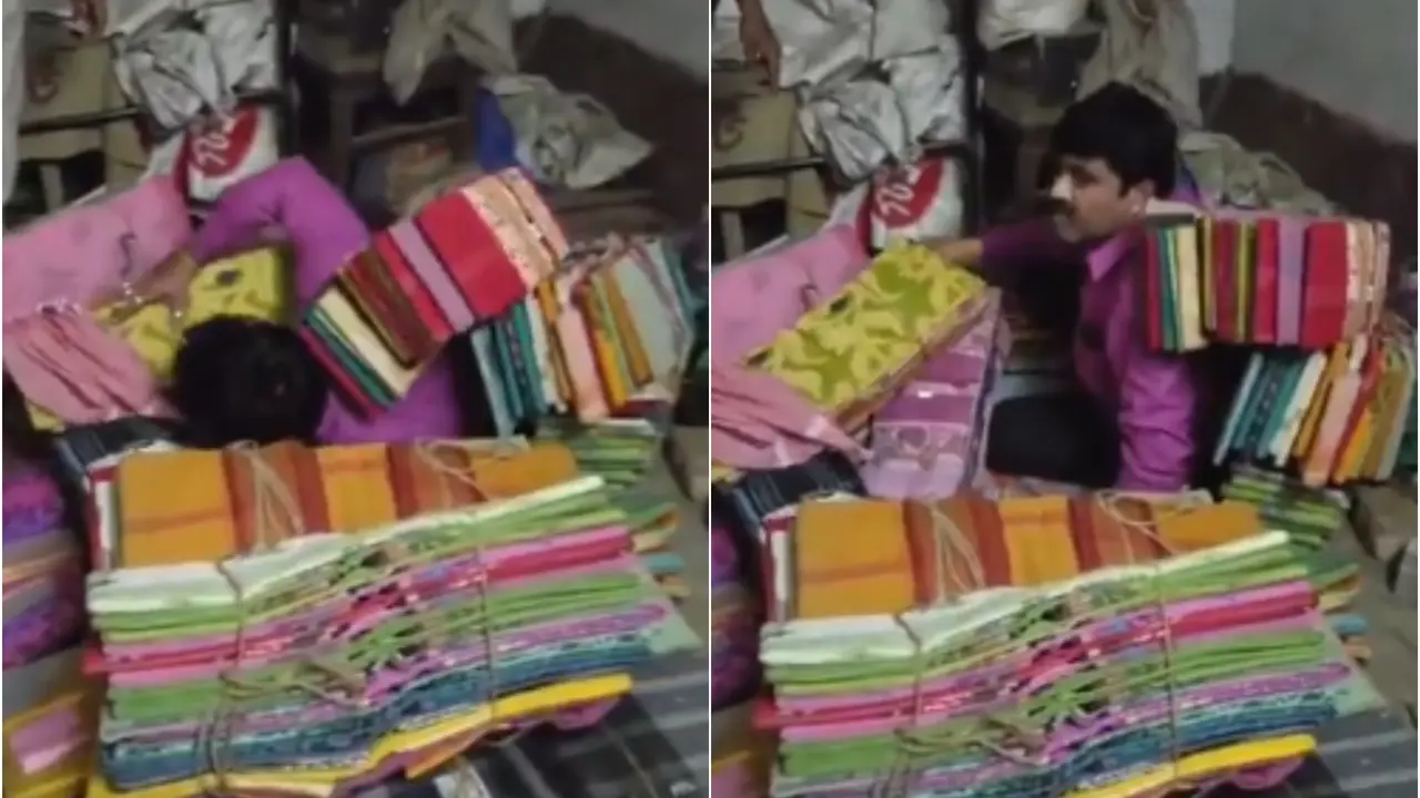 Video Of TMC Leader Hiding Himself Under Pile Of Sarees To Escape Police Goes Viral Video Of TMC Leader Hiding Himself Under Pile Of Sarees To Escape Police Goes Viral