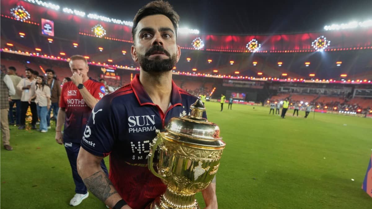 Virat Kohli celebrating with IPL 2026 trophy