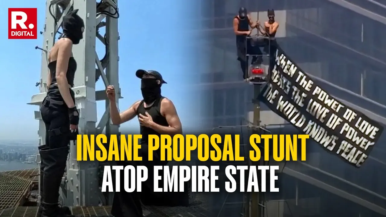 Climber Couple Arrested After Scaling Empire State Building Antenna for Apparent Marriage Proposal Climber Couple Arrested After Scaling Empire State Building Antenna for Apparent Marriage Proposal