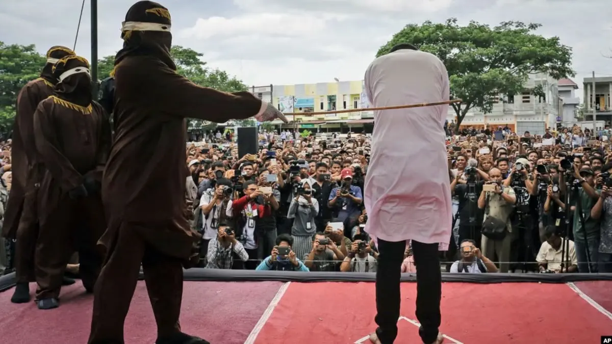 Couple Caught Kissing On TikTok Livestream Brutally Caned In Public For 'Violating Islamic Sharia Law' In Indonesia Couple Caught Kissing On TikTok Livestream Brutally Caned In Public For 'Violating Islamic Sharia Law'