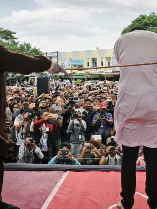 Couple Caught Kissing On TikTok Livestream Brutally Caned In Public For 'Violating Islamic Sharia Law'