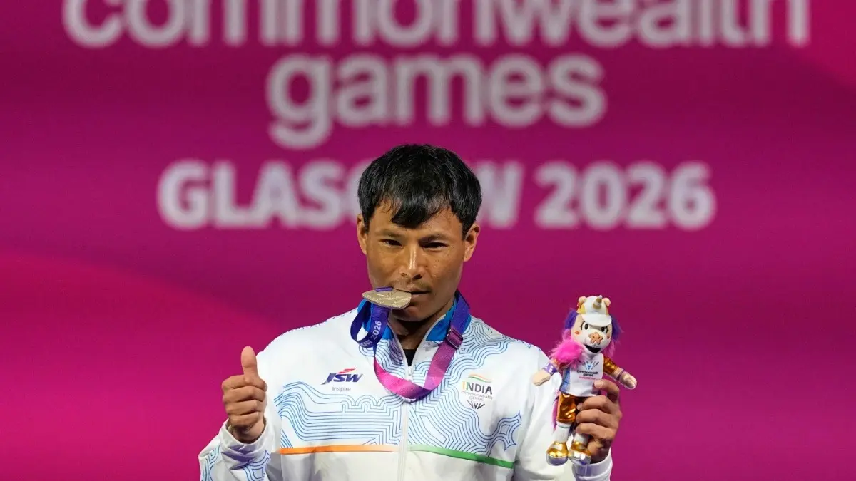 Rishikanta Singh Wins Silver At Commonwealth Games 2026 In Men's 60kg Weightlifting Event India's Rishikant Chanambam Singh celebrates after winning silver at CWG 2026