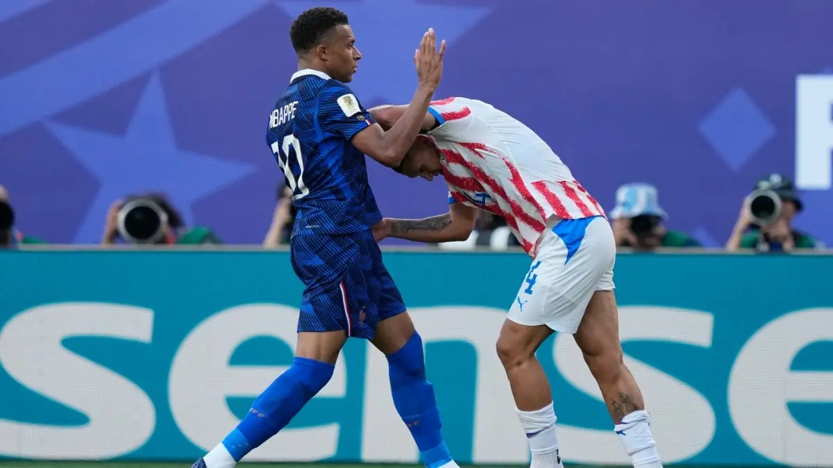 Kylian Mbappe Takes Jibe At Paraguay's Game Plan During RO16 Clash At FIFA World Cup 2026: 'We Can Get Our Hands Dirty' Kylian Mbappe and Juan Jose Caceres scuffle during France's clash against Paraguay